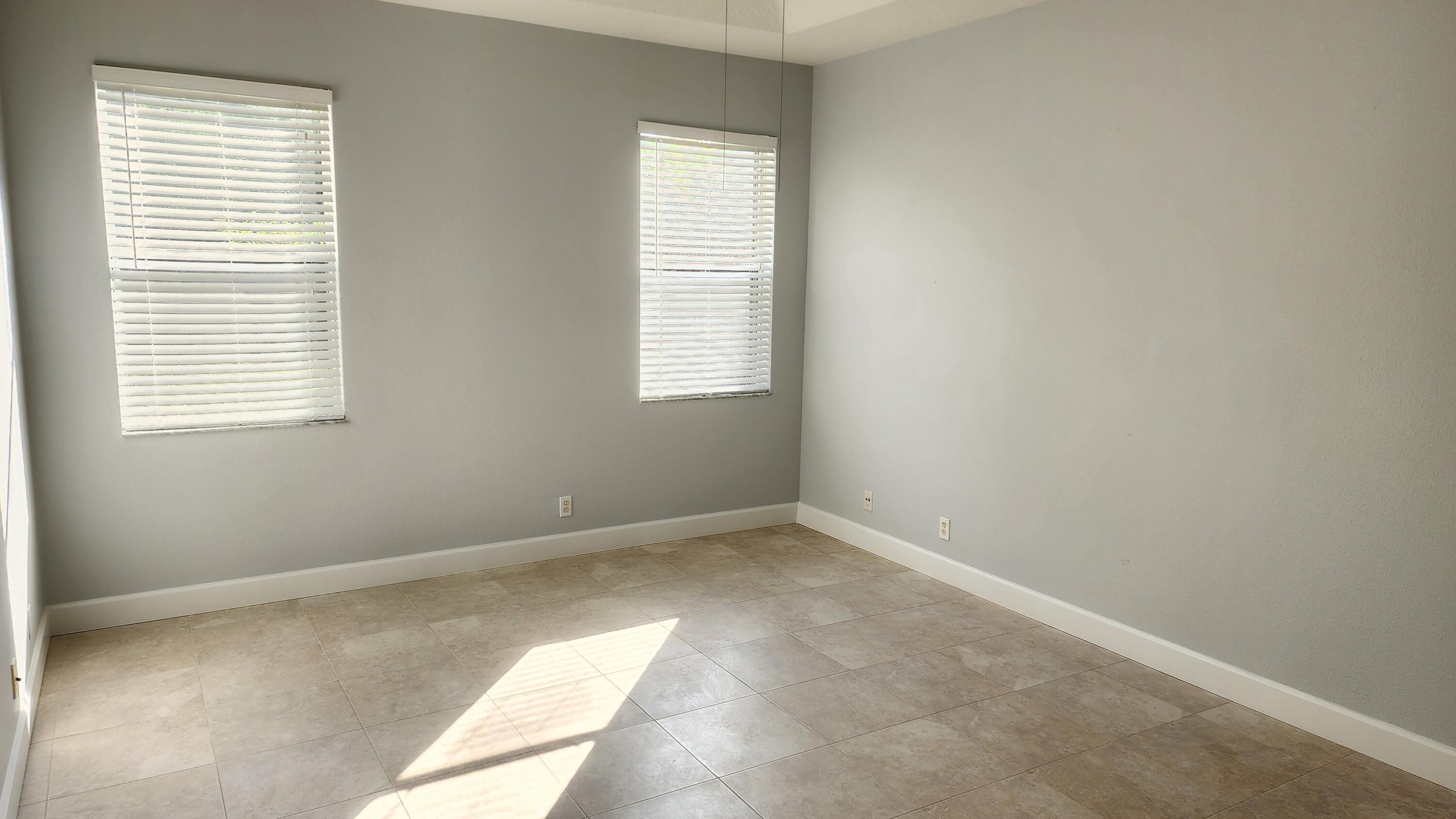 627 Southwest Byron Street Port St. Lucie, FL 34983 - Photo 4 of 10 Master Bed