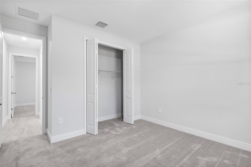 304 North Jungle Road Geneva, FL 32732 - Photo 36 of 49 an empty room with closet