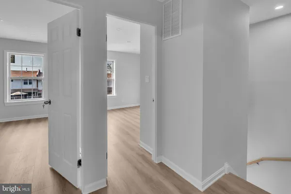 a view of a hallway with closet