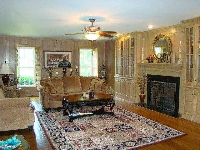 2754 Stutts Road Asheboro, NC 27205 - Photo 2 of 16 Den/Family/Great Room. Hardwood Floors, Built-Ins, Fireplace with Gas Logs