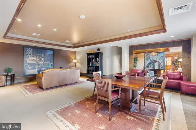 a view of a kitchen with a sink and cabinets