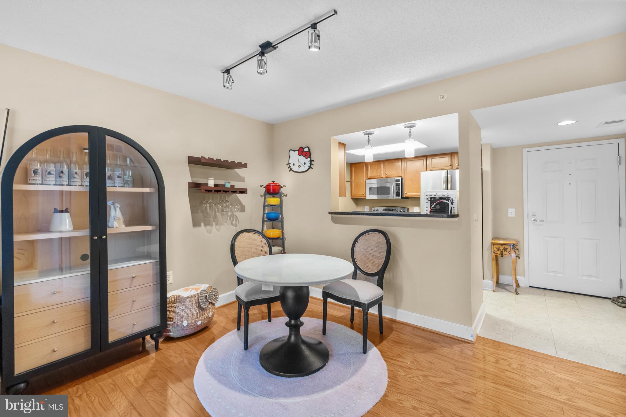 11800 Sunset Hills Road, Unit 409 Reston, VA 20190 - Photo 7 of 35 a room with furniture and a window