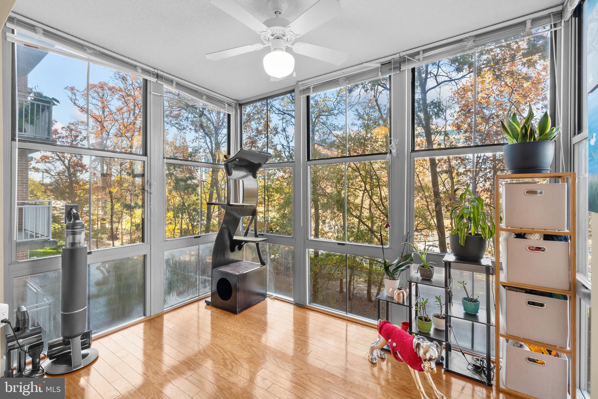 11800 Sunset Hills Road, Unit 409 Reston, VA 20190 - Photo 9 of 35 a view of a floor to ceiling window with a view of living room