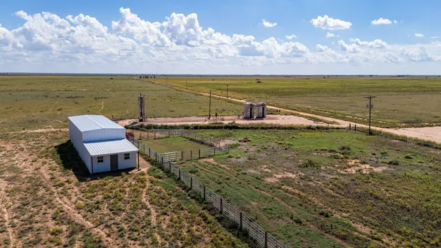 a view of an chairs in the balcony