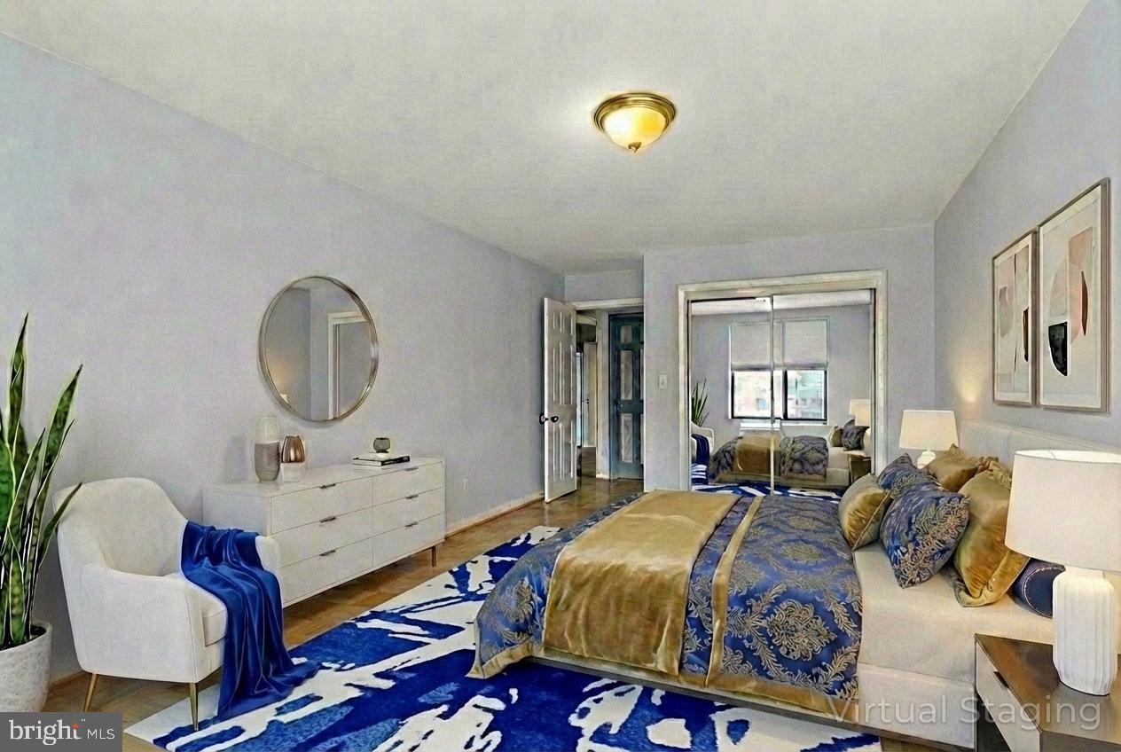 2501 Calvert Street Northwest, Unit 708 Washington, DC 20008 - Photo 20 of 21 a bed room with furniture and a window
