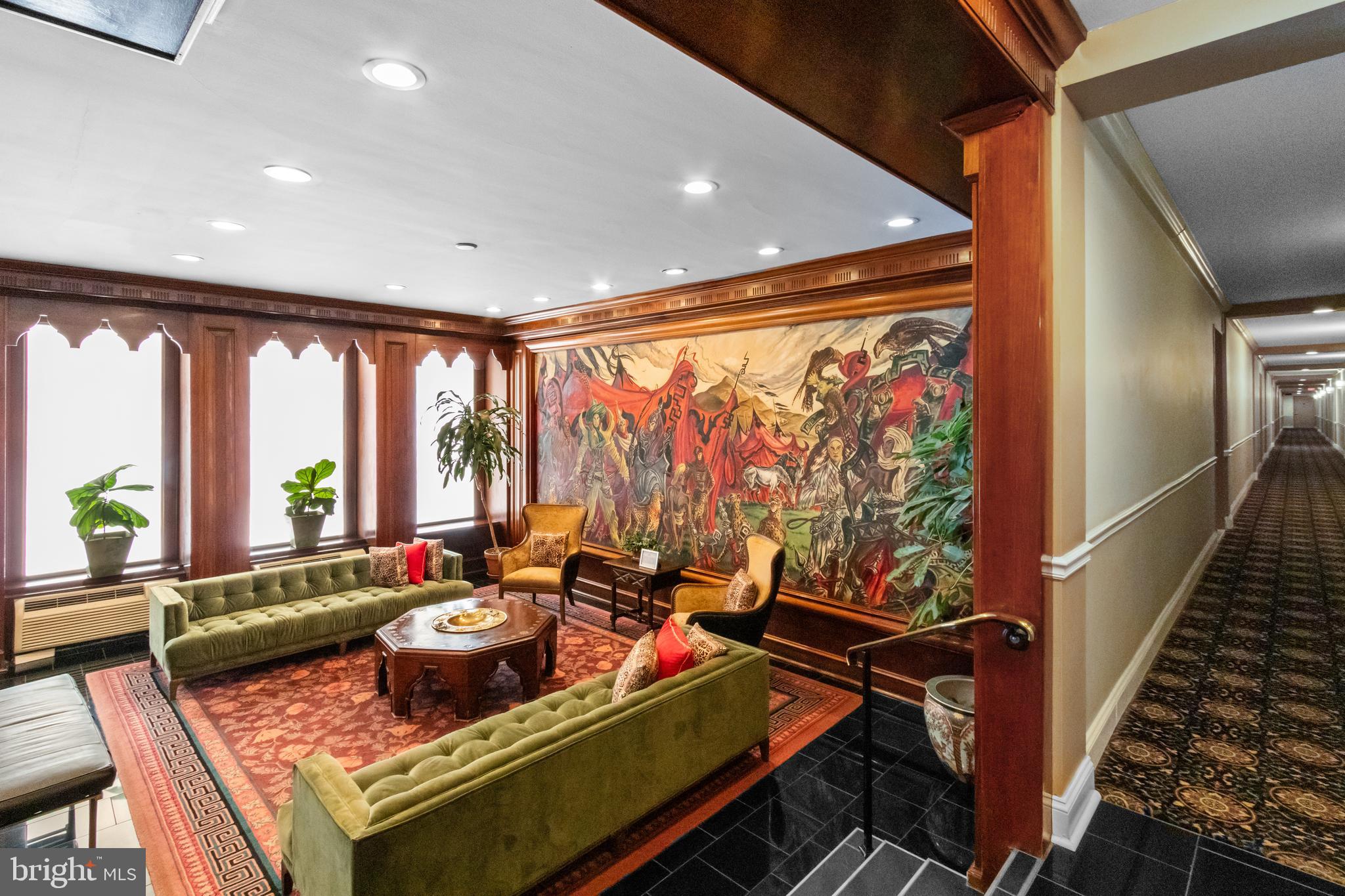 2501 Calvert Street Northwest, Unit 708 Washington, DC 20008 - Photo 3 of 21 a living room with furniture city view and large windows