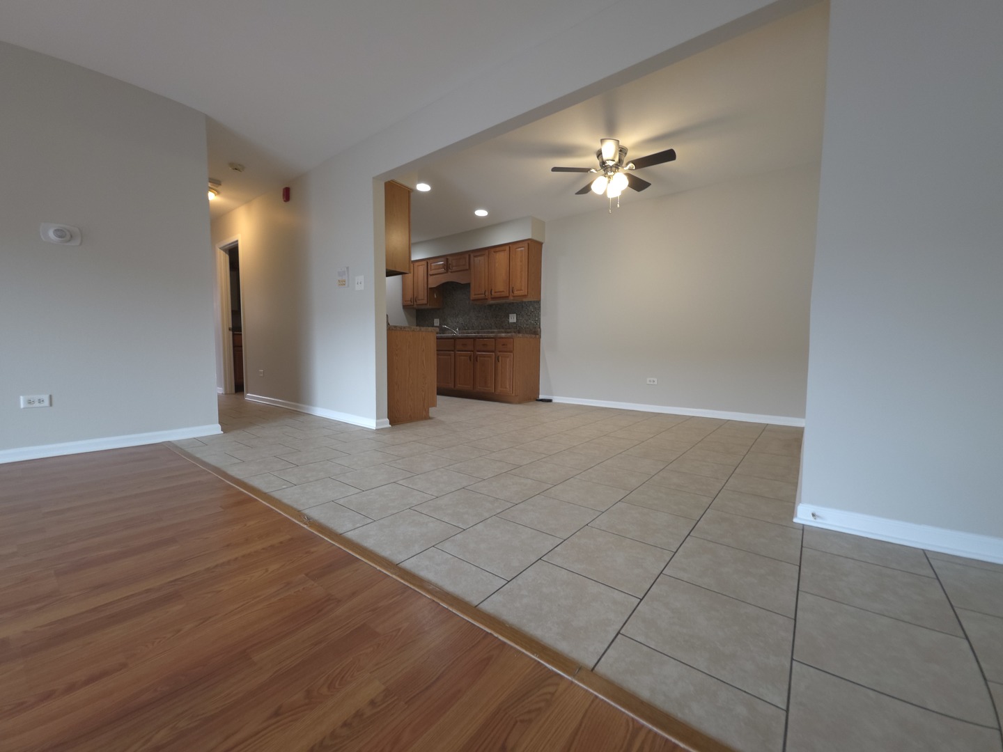412 East Bailey Road, Unit 101 Naperville, IL 60565 - Photo 2 of 12 a view of a livingroom with a kitchen