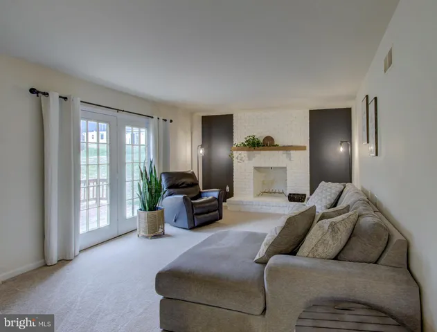 a view of a park with large trees