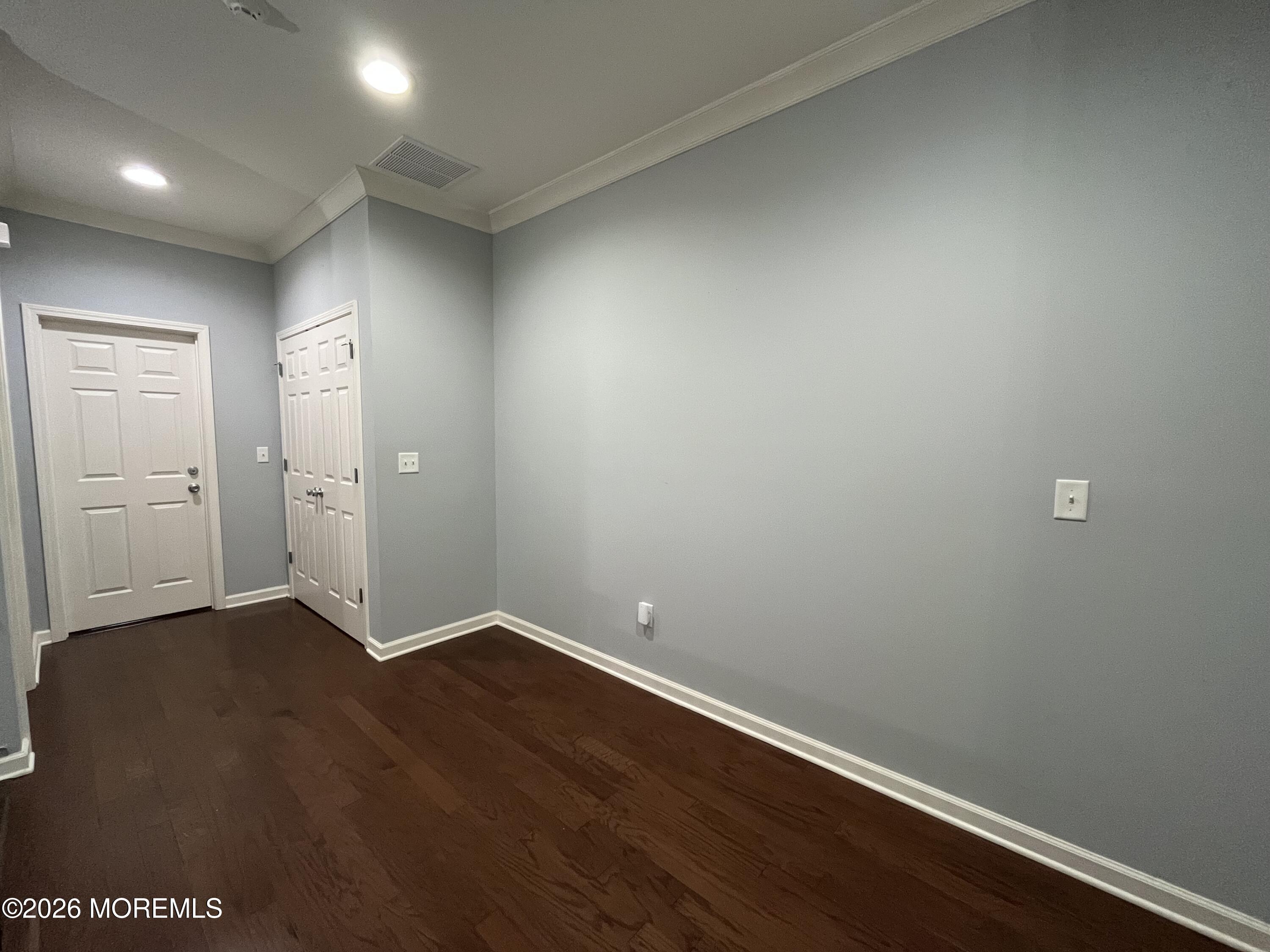 206 Hawthorne Lane Barnegat, NJ 08005 - Photo 16 of 49 an empty room with wooden floor and closet