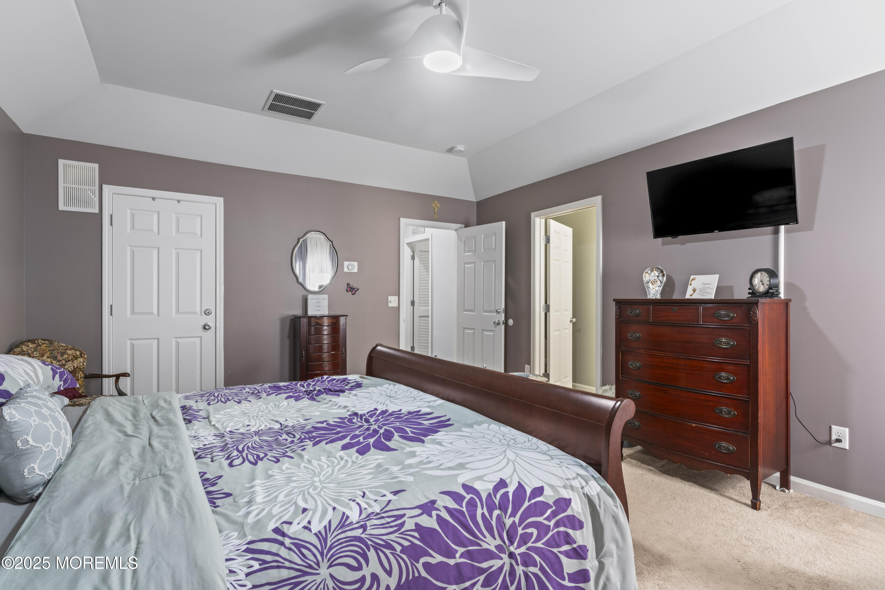 206 Hawthorne Lane Barnegat, NJ 08005 - Photo 24 of 49 a bedroom with a bed and a flat screen tv