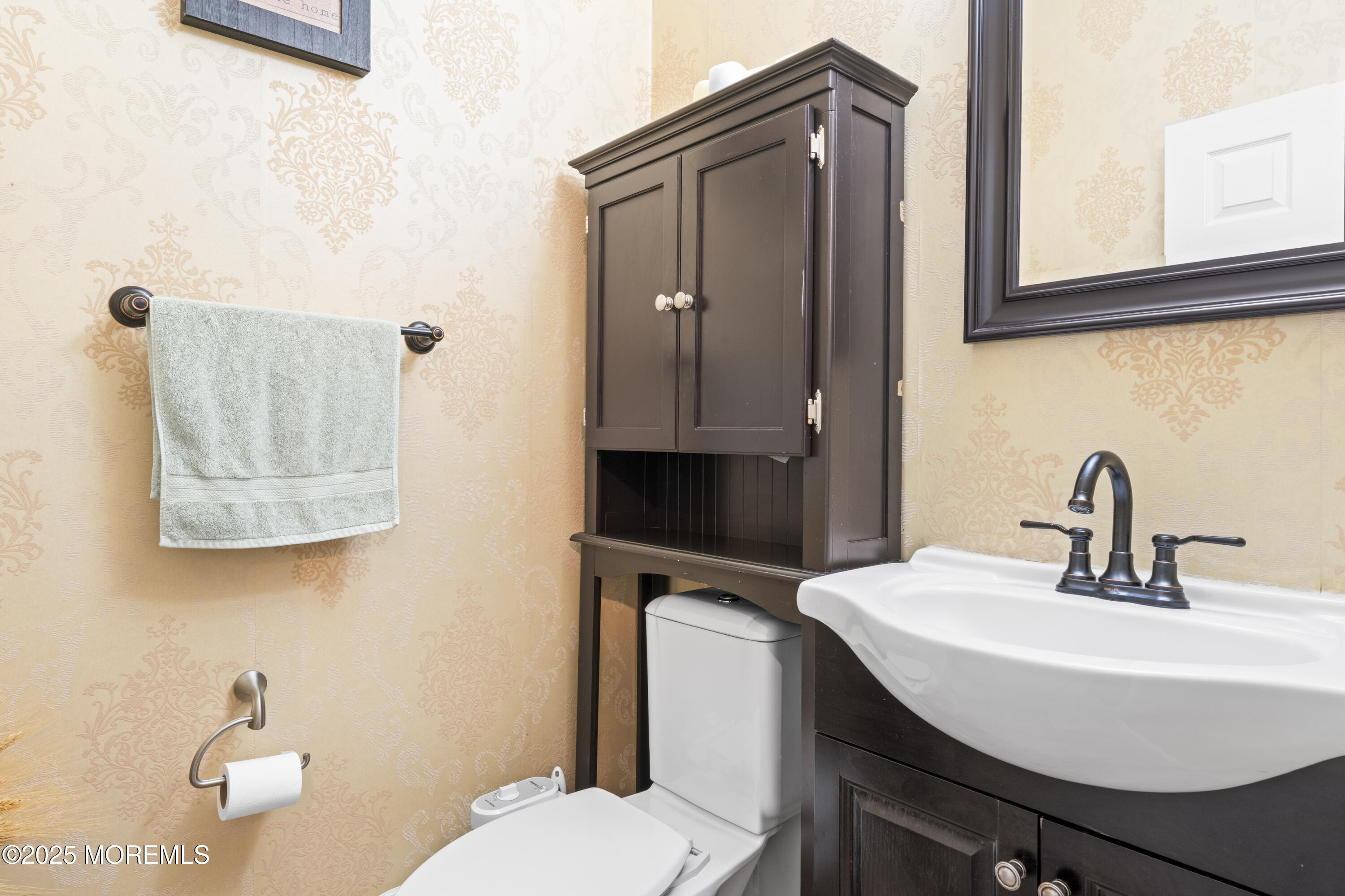 206 Hawthorne Lane Barnegat, NJ 08005 - Photo 4 of 49 a bathroom with a sink a toilet and mirror
