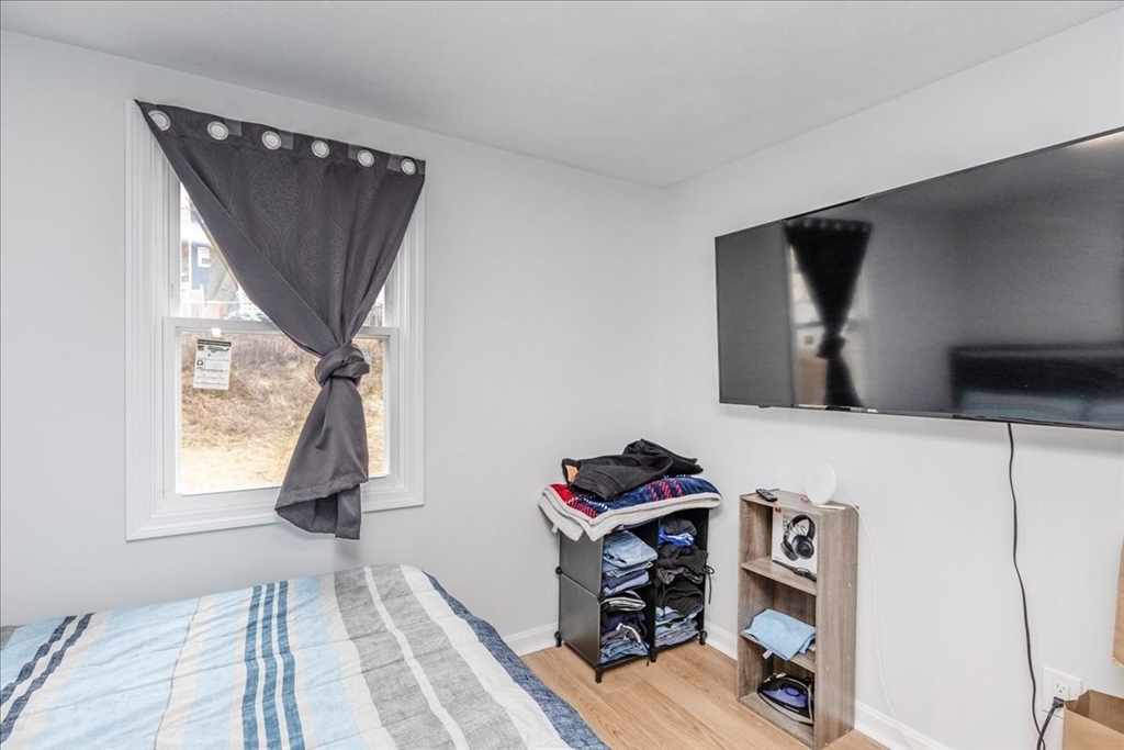 38 Warren Street Revere, MA 02151 - Photo 32 of 42 a living room with furniture and a window