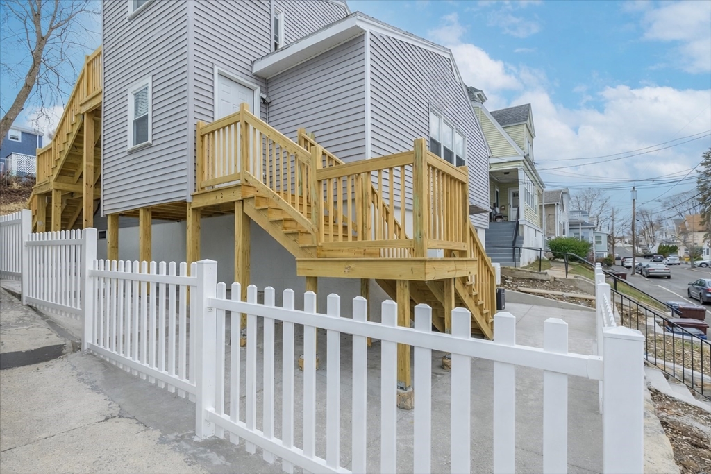 38 Warren Street Revere, MA 02151 - Photo 42 of 42 a view of a house with a wooden fence