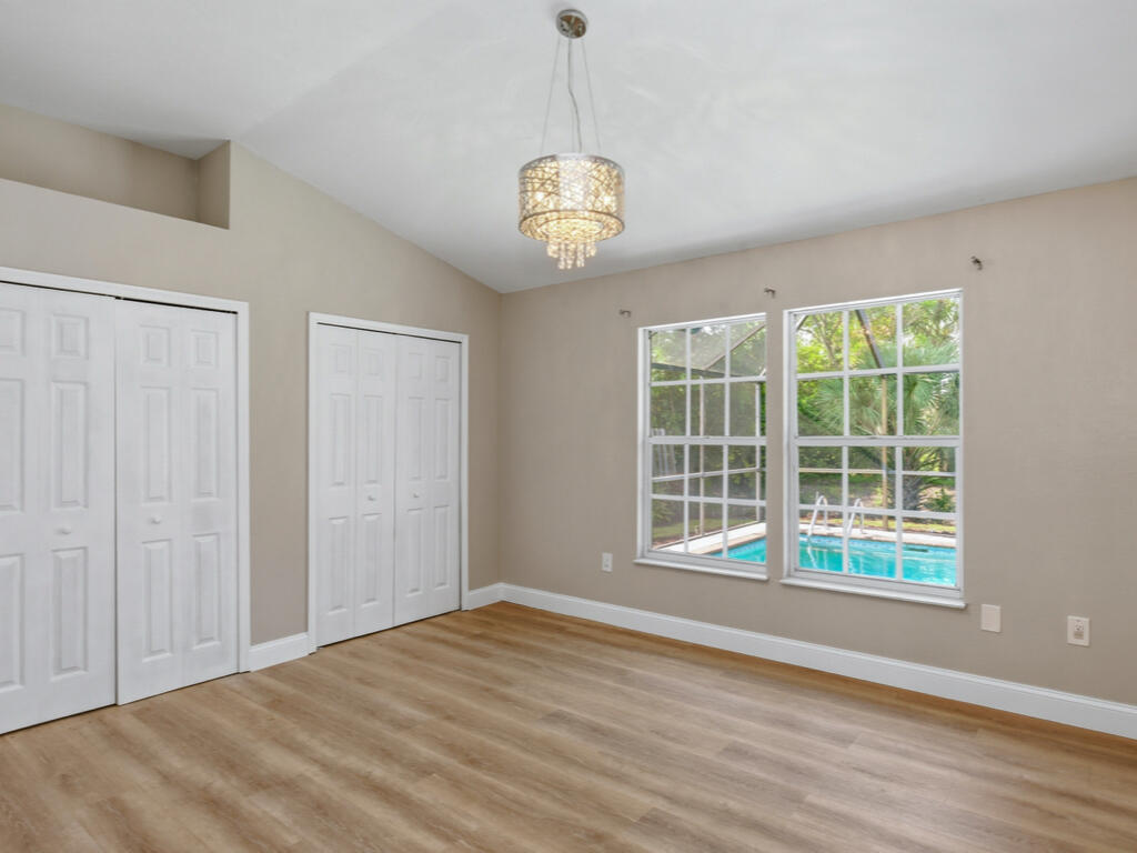 3650 Kent Drive Naples, FL 34112 - Photo 15 of 17 a view of an empty room with a window