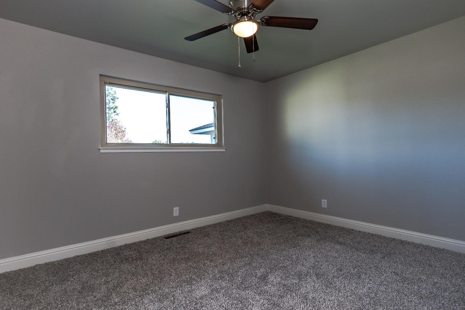 6587 North First Street Fresno, CA 93710 - Photo 21 of 51 an empty room with a window