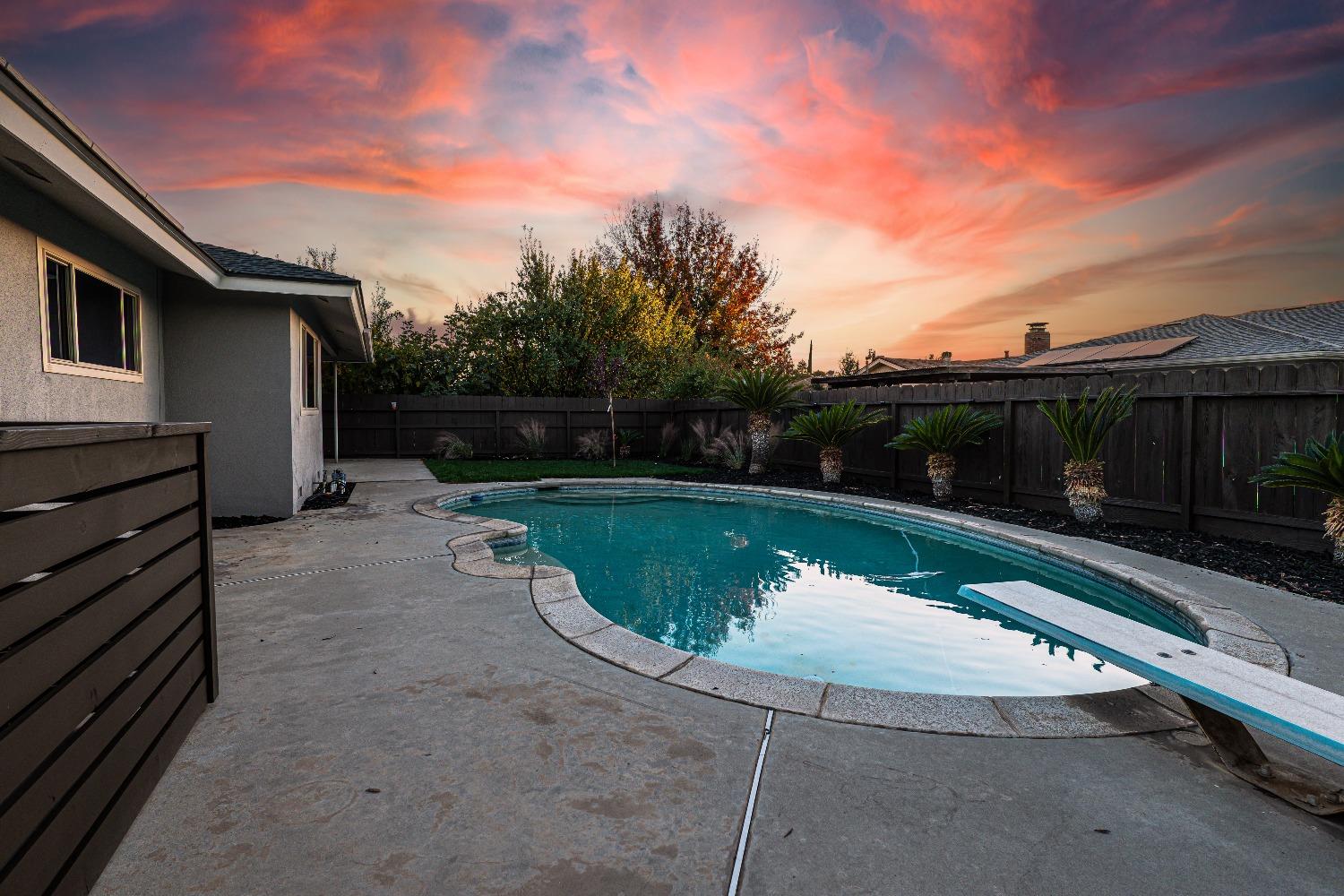6587 North First Street Fresno, CA 93710 - Photo 50 of 51 a view of a swimming pool with a patio