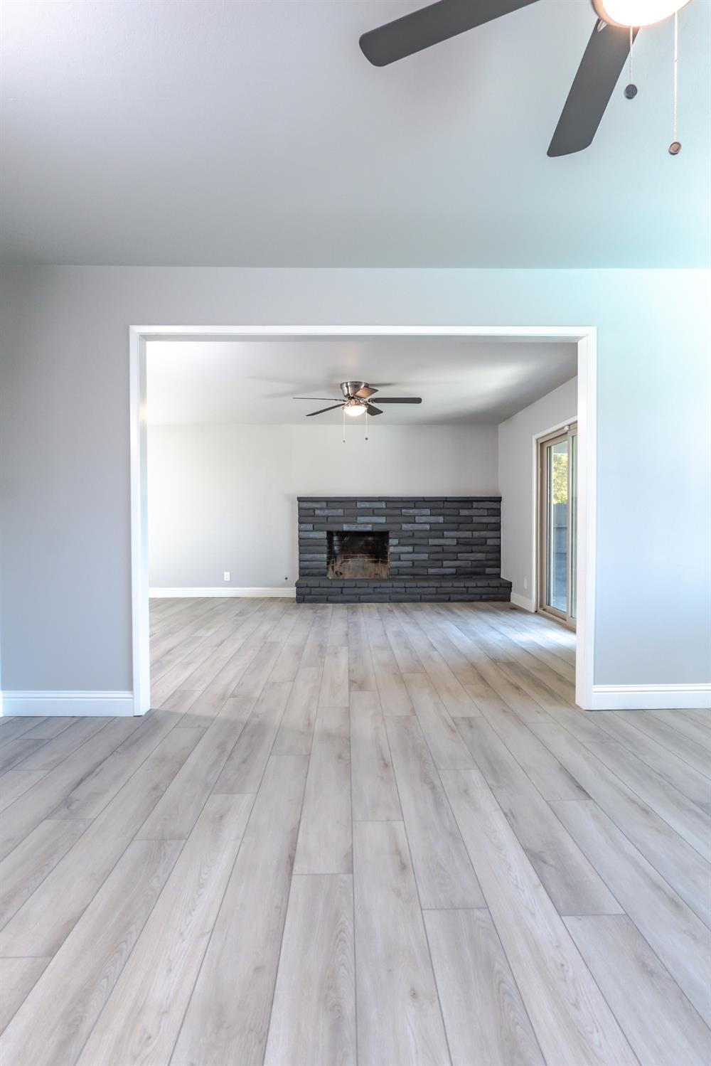 6587 North First Street Fresno, CA 93710 - Photo 8 of 51 a view of empty room with wooden floor