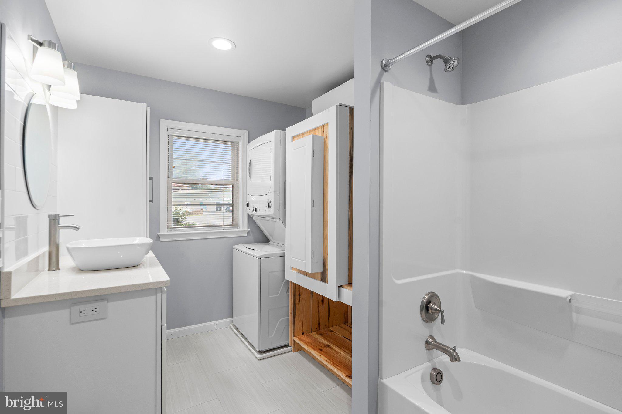 44600 Tall Timbers Road, Unit B Tall Timbers, MD 20690 - Photo 17 of 23 Tub/Shower and Laundry