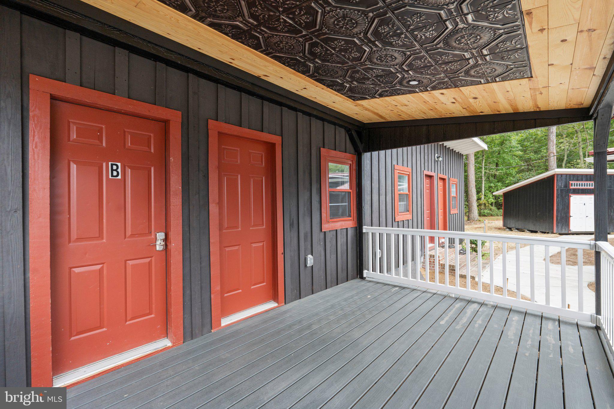 44600 Tall Timbers Road, Unit B Tall Timbers, MD 20690 - Photo 6 of 23 So much room on this covered porch!