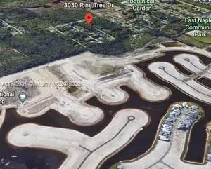 a view of a chair and table in the yard