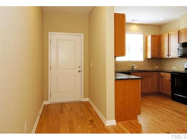 748 Wickham Ridge Road, Unit 115 Apex, NC 27539 - Photo 3 of 25 Hardwood floors through first floor! (Photo of like design. Colors/selections may vary - ask onsite agent for details.)
