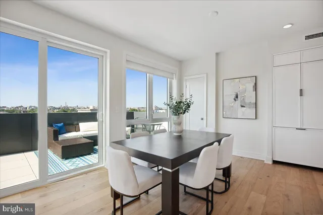 a view of a terrace with couches and a table