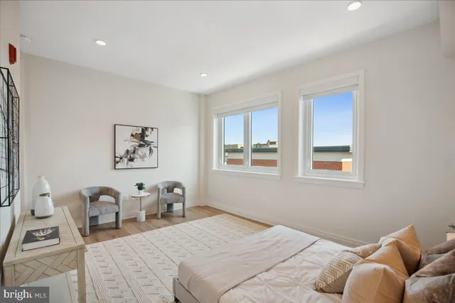 a bedroom with a bed and furniture