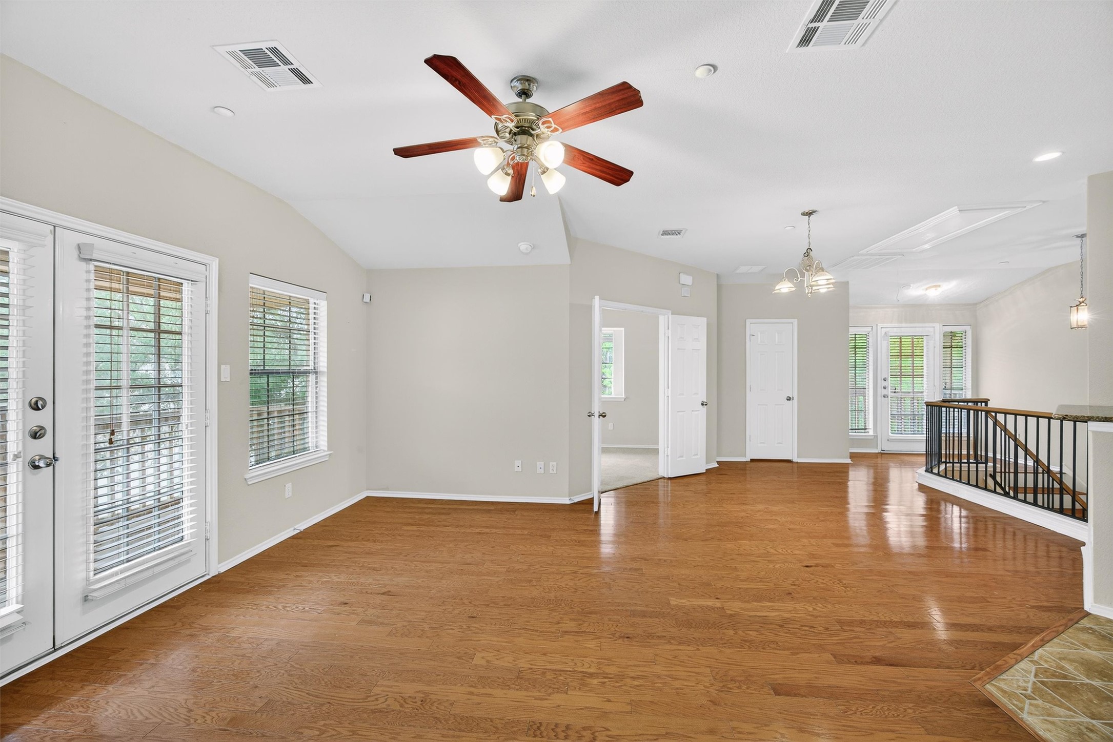 1310 West Parmer Lane, Unit 601 Austin, TX 78727 - Photo 18 of 40 a view of an empty room with window and a ceiling fan