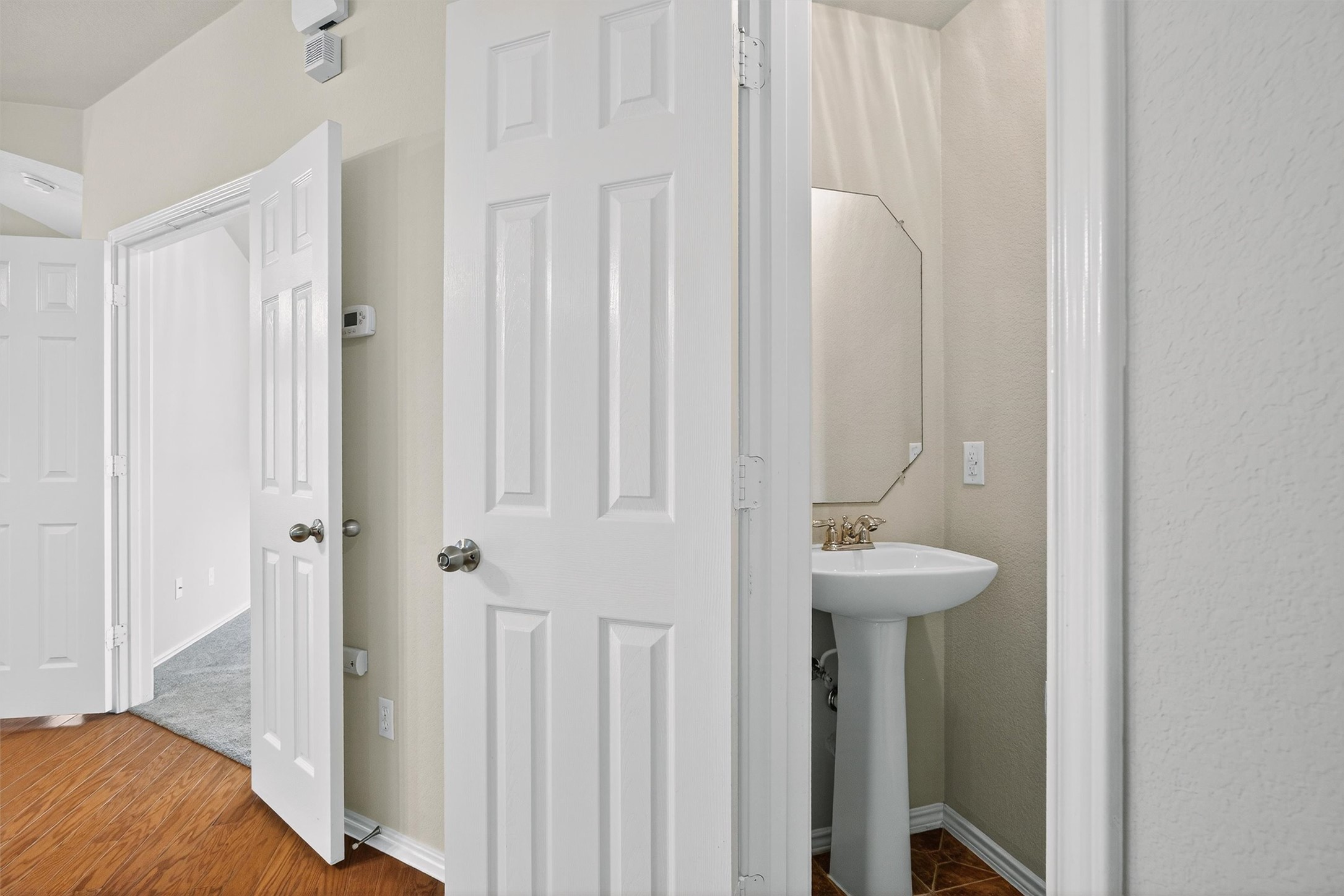 1310 West Parmer Lane, Unit 601 Austin, TX 78727 - Photo 7 of 40 a bathroom with a sink and mirror