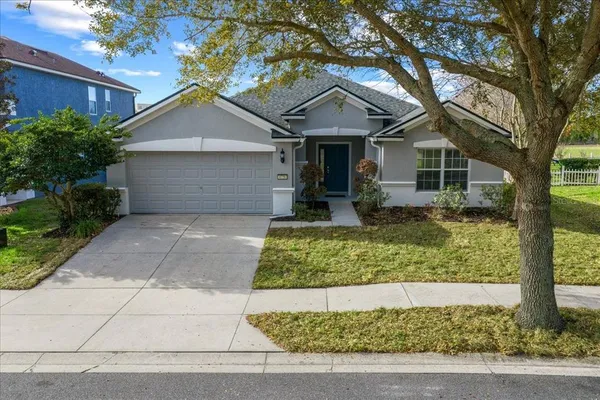 front view of a house with a yard