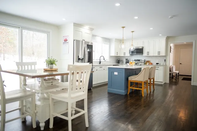 a view of a dining room with furniture