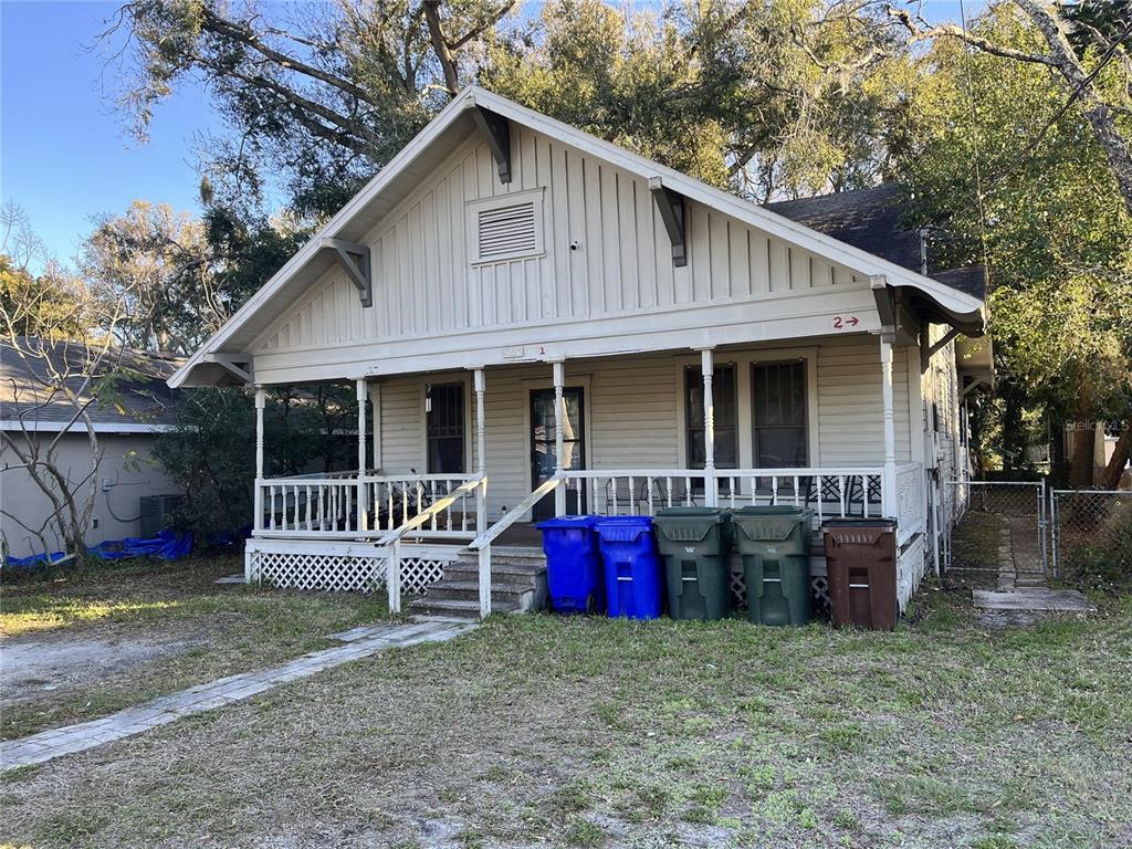 a front view of a house with garage