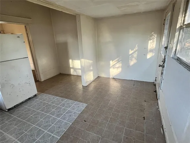 a view of a hallway with a large window