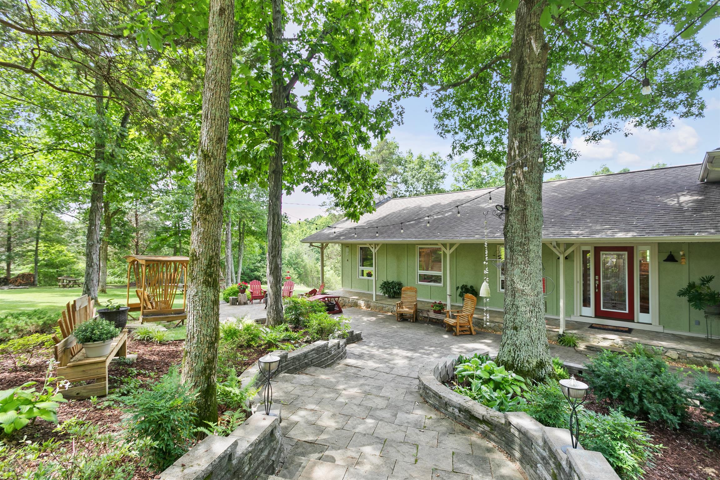 1534 Iron Bridge Road Columbia, TN 38401 - Photo 1 of 30 a front view of a house with a porch