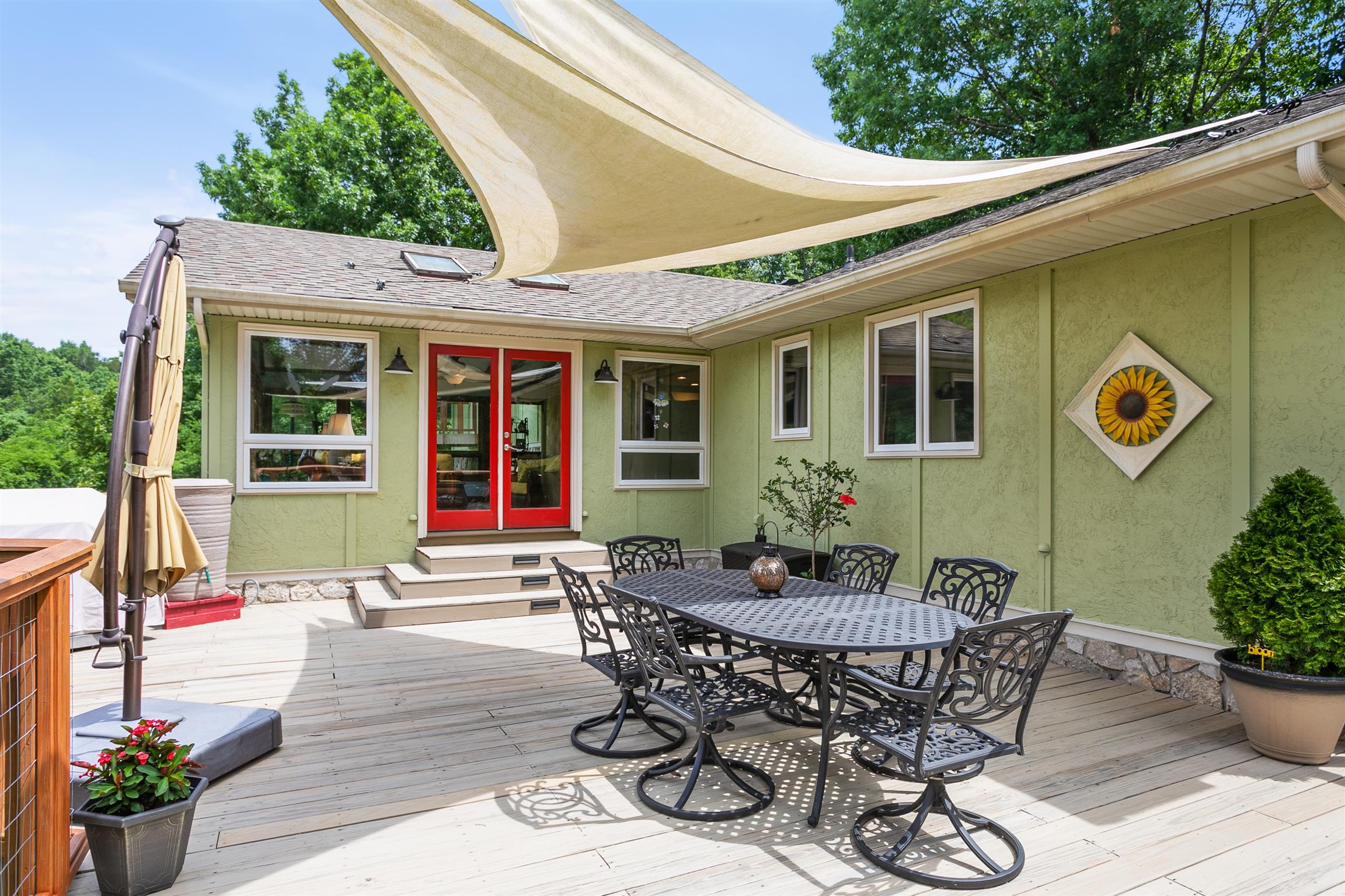 1534 Iron Bridge Road Columbia, TN 38401 - Photo 12 of 30 a view of a patio with table and chairs and potted plants
