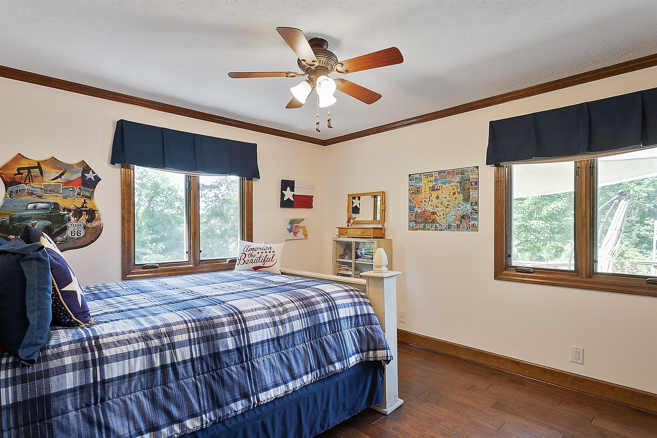 1534 Iron Bridge Road Columbia, TN 38401 - Photo 14 of 30 a bedroom with a large bed and a large window