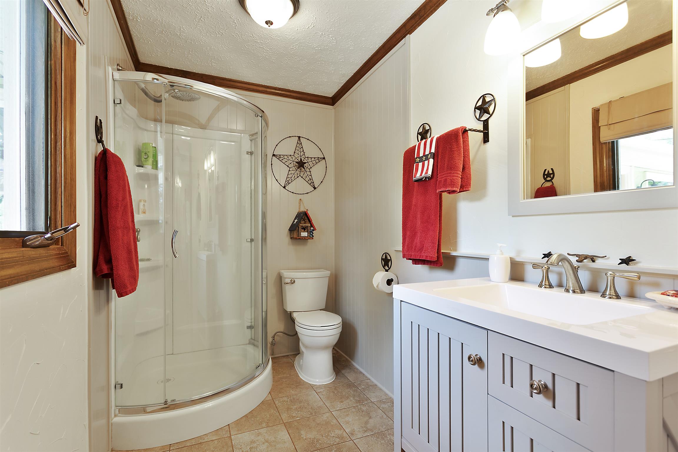 1534 Iron Bridge Road Columbia, TN 38401 - Photo 15 of 30 a bathroom with a sink a toilet and shower