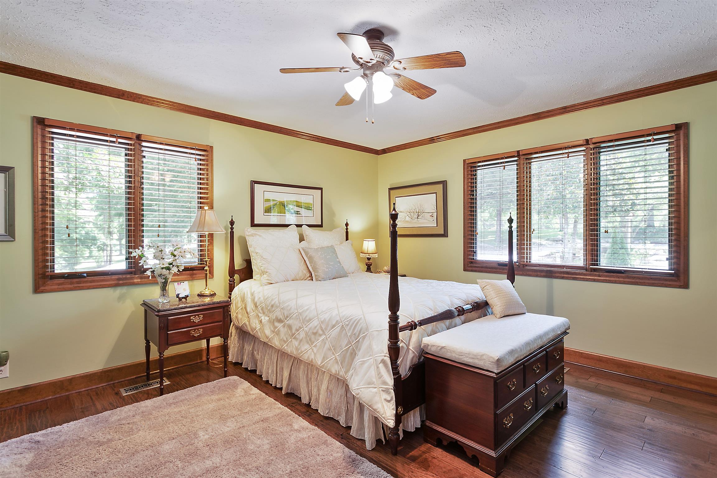 1534 Iron Bridge Road Columbia, TN 38401 - Photo 16 of 30 a bed room with a bed and a chandelier