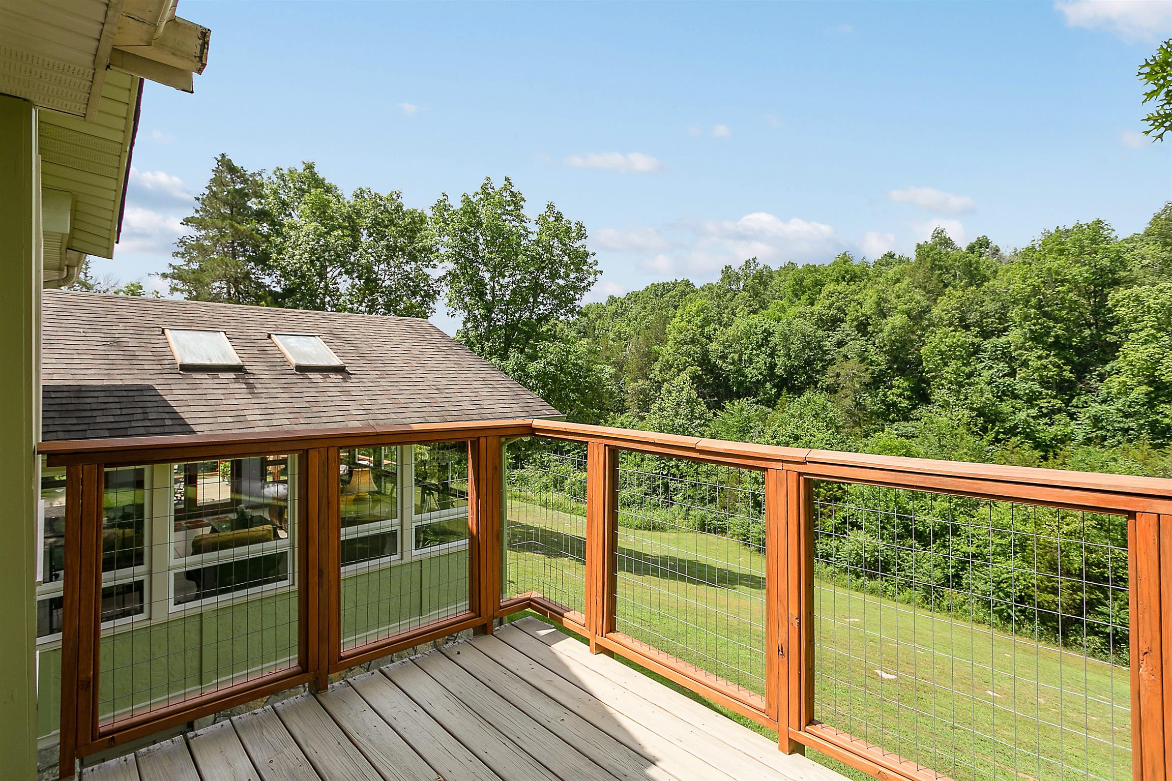 1534 Iron Bridge Road Columbia, TN 38401 - Photo 22 of 30 a balcony with wooden floor and outdoor space