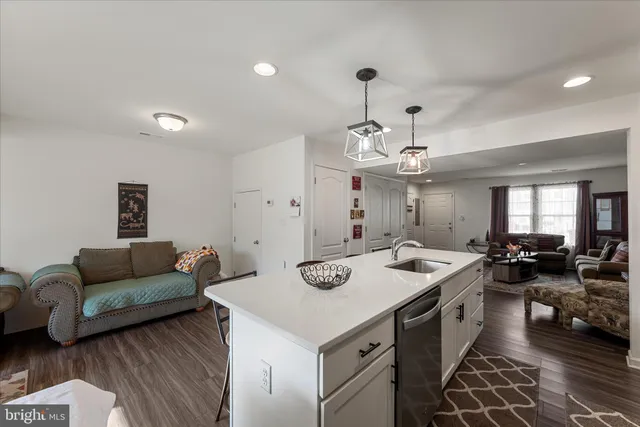 a view of a livingroom with furniture and window