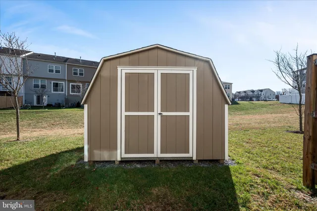 a view of a garden with an outdoor space