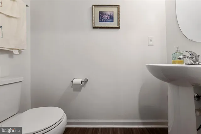 a bathroom with a toilet and a sink