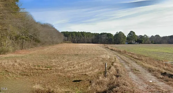 a view of balcony with wooden floor