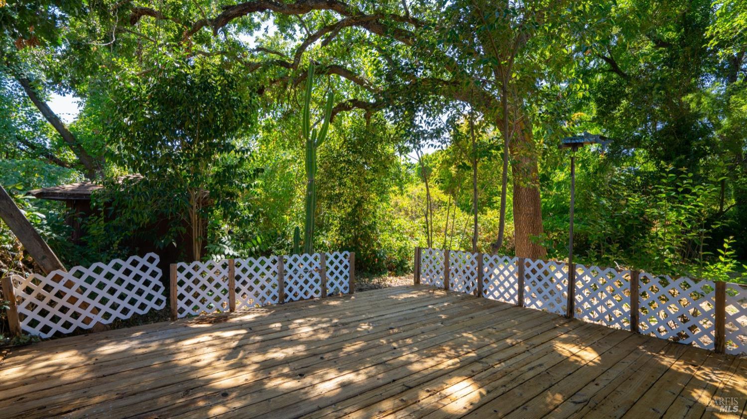 5210-5214 Fulton Road Santa Rosa, CA 95403 - Photo 19 of 60 a view of a wooden fence