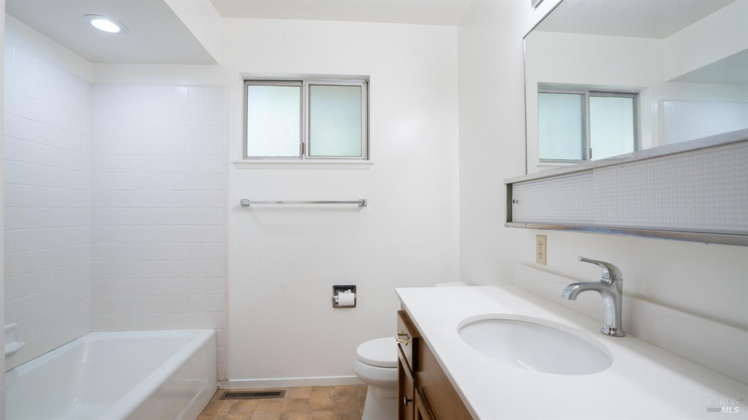 5210-5214 Fulton Road Santa Rosa, CA 95403 - Photo 24 of 60 a bathroom with a sink and a tub