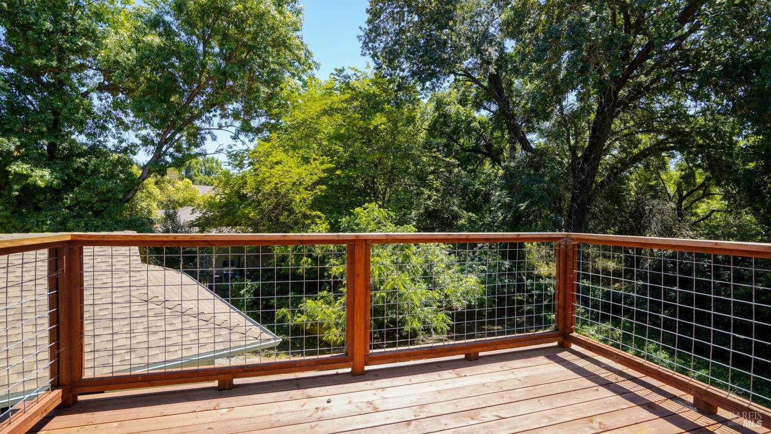 5210-5214 Fulton Road Santa Rosa, CA 95403 - Photo 37 of 60 a view of balcony with wooden floor