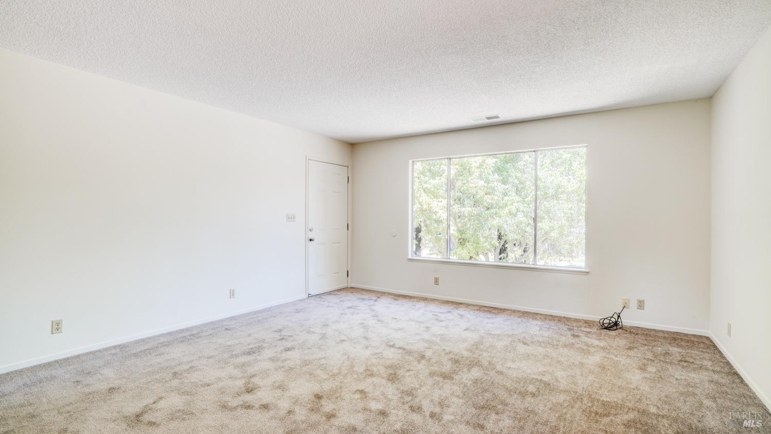 5210-5214 Fulton Road Santa Rosa, CA 95403 - Photo 38 of 60 an empty room with a window