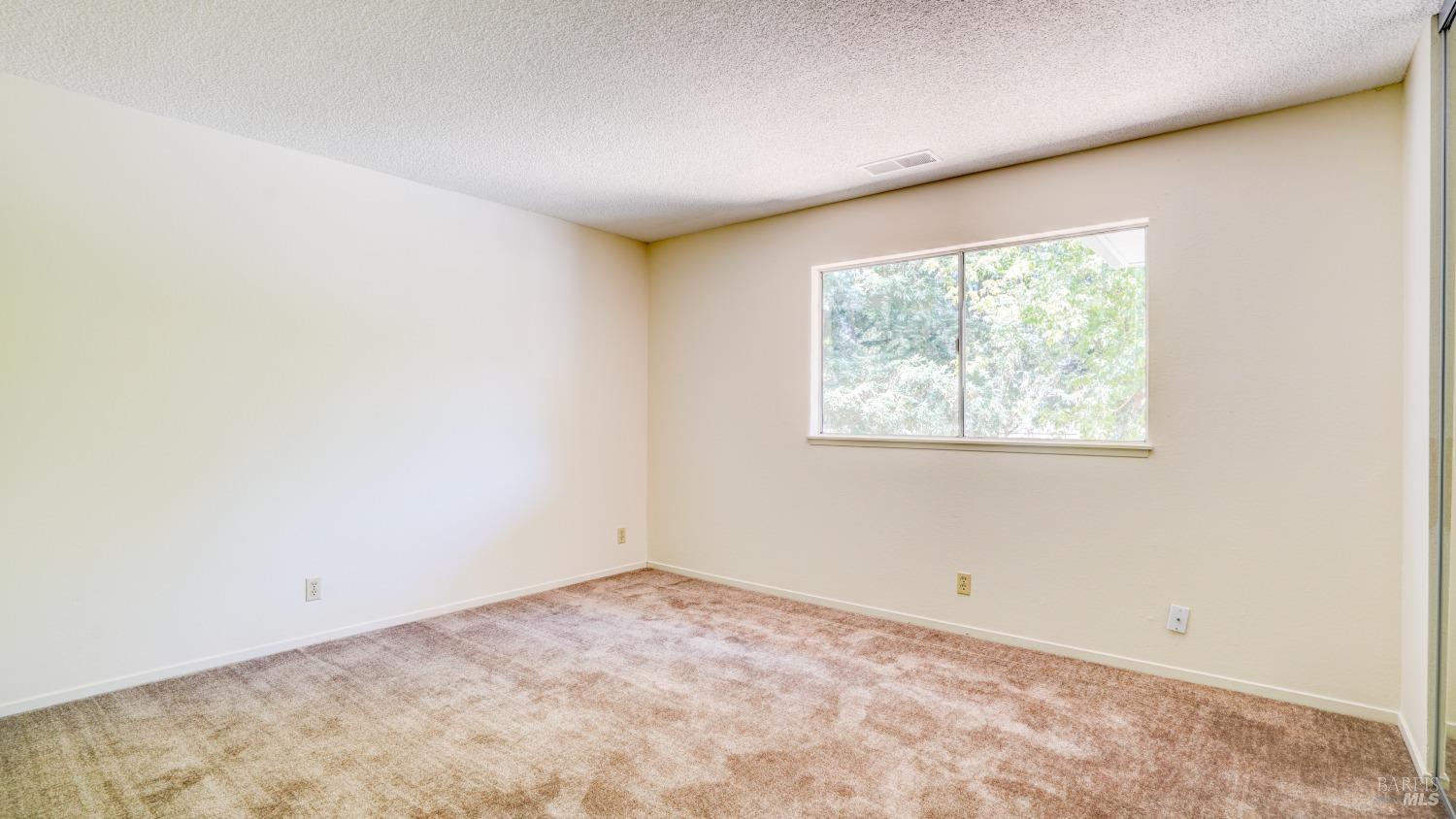 5210-5214 Fulton Road Santa Rosa, CA 95403 - Photo 40 of 60 an empty room with a window