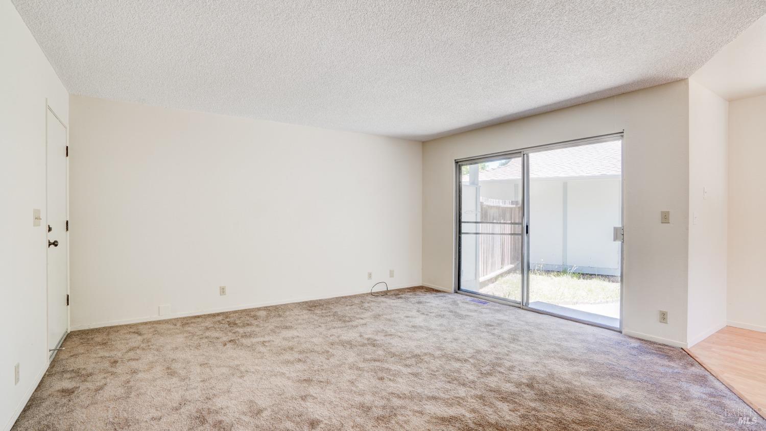 5210-5214 Fulton Road Santa Rosa, CA 95403 - Photo 45 of 60 an empty room with sliding door