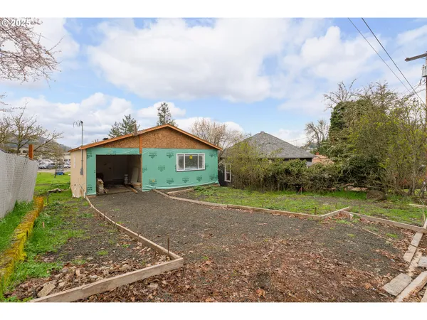 a view of backyard of house